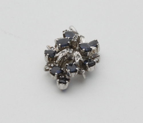 A sapphire and diamond pendant,