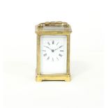 A gilt brass cased carriage clock,