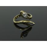 A gold serpent ring,