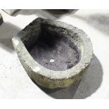 A pear-shaped stone trough,