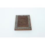 An Indian sadeli and carved inlaid card case carved with an elephant within bushes,