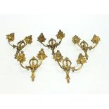 A set of five French ormolu two-branch wall lights in Louis XV style Condition Report: Some