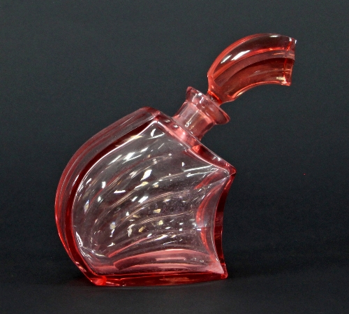 An Art Deco style pink glass perfume bottle and stopper,