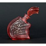 An Art Deco style pink glass perfume bottle and stopper,