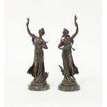 A pair of spelter figures, after Auguste Moreau, named Pax and La Terre,