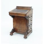 A Victorian walnut Davenport desk,