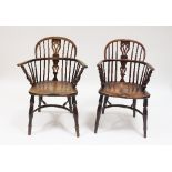 A matched pair of 18th Century yew and elm wood Windsor type armchairs with stick and pierced splat