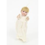 An Armand Marseille bisque head doll with weighted eyes, open mouth and moving limbs,