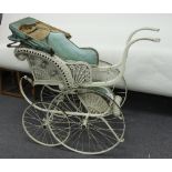 A doll's Victorian pram with wicker body,