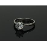 A diamond solitaire ring, the claw set stone of approximately 1.