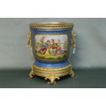 A magnificent large Sevres jardinière with hand painted panel of children at play, gilt highlights