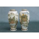 A pair of Japanese Maiji period Satsuma vases having landscape decoration, signed. Height 12cm,