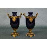 A fine pair of French 19th century cobalt blue porcelain vases with ormolu mounts. Height 14cm,