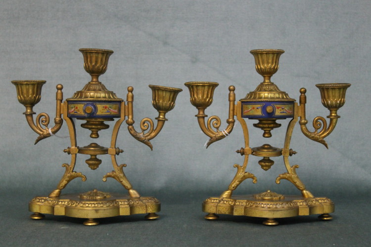 A good pair of French 19th century Sevres and ormolu candelabra. Height 19cm, Width 19cm