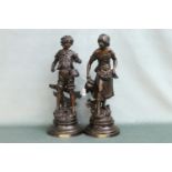 A pair of French 19th century spelter figures of the young maiden and boy. Height 47cm, Width 18cm