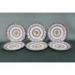 A fine set of six French Sevres cabinet plates having hand painted rose decoration with gilt