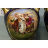 A pair of 19th century Royal Vienna lidded vases with hand painted panels of the classical maidens