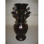 20th Century bronze vase decorated in relief 45 cm high