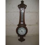 20th Century carved oak anoroid barometer 65 cm high