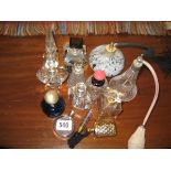 Thirteen various glass perfume bottles etc