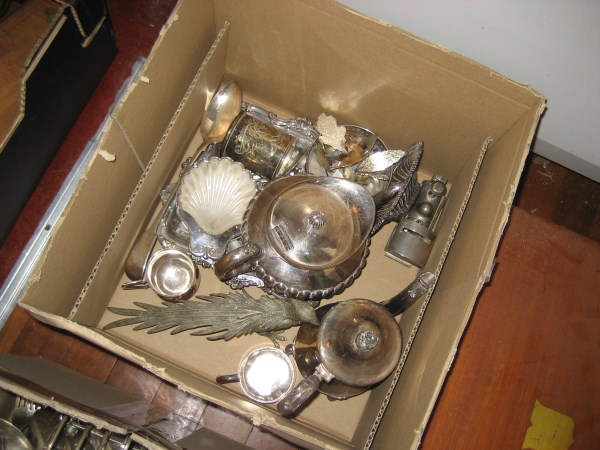 A silver plated tea pot, a silver plate serving spoon etc (the contents of 1 box)