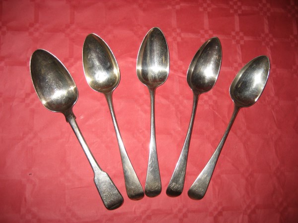 Five silver spoons