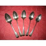 Five silver spoons