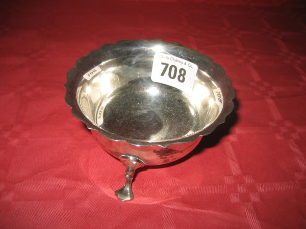 A silver sugar bowl raised on three pad feet Chester 1923