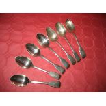 Seven matched silver table spoons