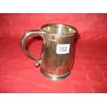 A silver tankard of cylindrical form Sheffield 1954