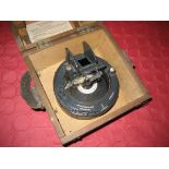 A cased military compass together with accompanying stand etc (3)