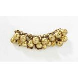 LINE VAUTRIN (1913-1997)
LE MONDE EST PLEIN DE FOUS
Bracelet ou chaîne de cheville en bronze doré,