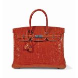 SAC BIRKIN 35 EN CROCODILE POROSUS LISSE ORANGE, GARNITURE EN MÉTAL ARGENTÉ PALLADIÉ
HERMÈS, 2007