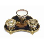 A LOUIS XV ORMOLU, CHINESE BLACK AND GILT LACQUER AND CHINESE PORCELAIN ENCRIER
CIRCA 1730-40
The