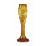 AN EMILE GALLE (1846-1904) FIRE-POLISHED CAMEO GLASS VASE
CIRCA 1900
The clear body cased in white