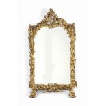 AN ITALIAN GILTWOOD PIER MIRROR
LATE 19TH CENTURY
Carved overall with foliage, with C-scroll