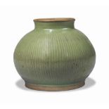 A SOUTH EAST ASIAN CELADON GLOBULAR JAR
19TH/20TH CENTURY
The body with ribbed decoration, the