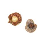 Two cultured pearl and gem-set rings
The first set with a brown cultured pearl, measuring