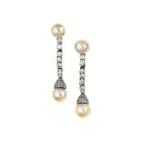 A pair of cultured pearl and diamond earrings
Each with cultured pearl drop, measuring approximately