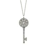 A platinum diamond-set 'Petals' pendant, by Tiffany & Co.
Modelled as a key, the pavé diamond bow of