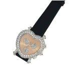 An 18ct white gold diamond-set quartz wristwatch, by Corum
The pale pink heart-shaped dial with