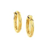 A pair of earrings, by Cartier
Each designed as a polished hoop, clip and post fittings, 3.1 cm