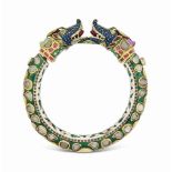 AN ENAMELLED DIAMOND AND RUBY-SET GOLD BANGLE   JAIPUR, NORTH INDIA, 19TH CENTURY