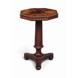 A GEORGE IV ROSEWOOD OCCASIONAL TABLE
CIRCA 1830, POSSIBLY IRISH
Decorated overall with bead-and-