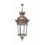 A VICTORIAN COPPER AND BRASS MOUNTED LANTERN
LATE 19TH CENTURY
The tapering glazed body with a domed