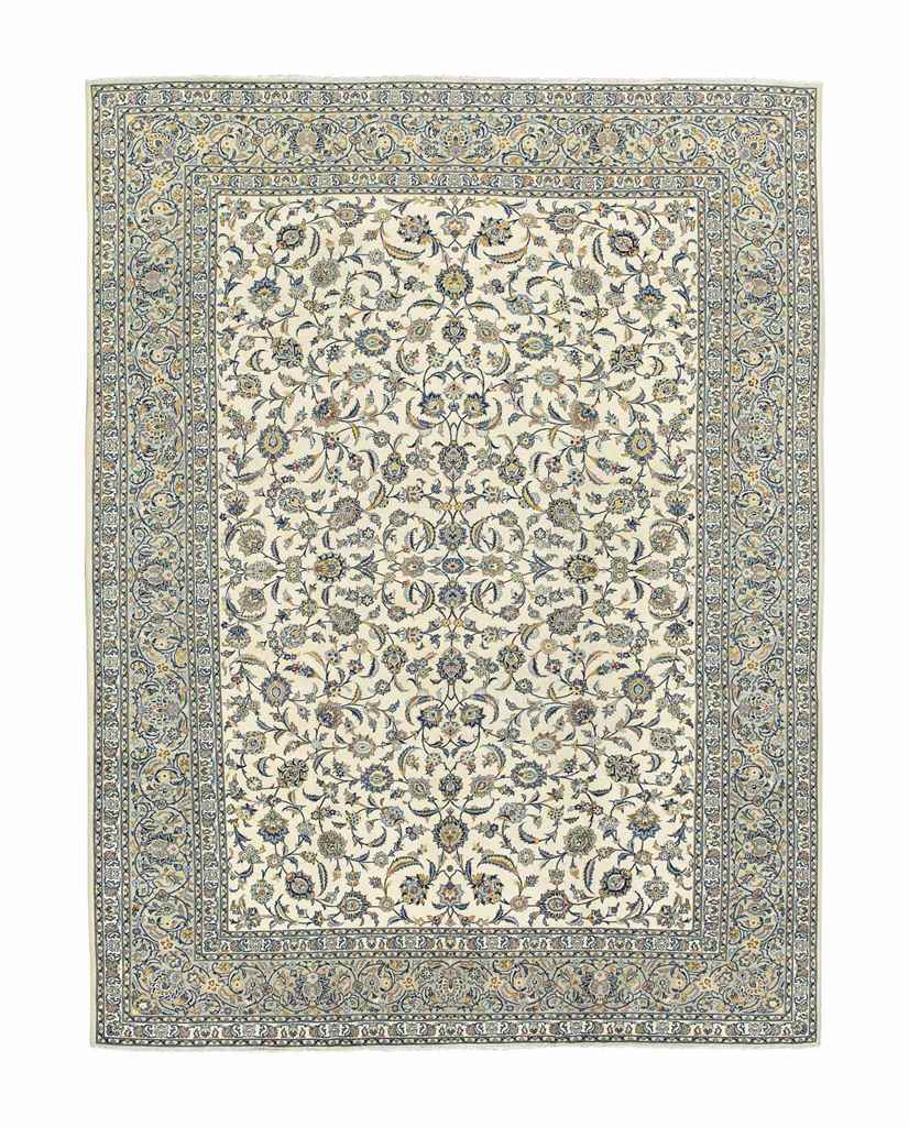 A fine Kashan carpet
approx: 13ft.3in. x 10ft.2in.(403m. x 309cm.)