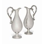 A MATCHED PAIR OF VICTORIAN SILVER CLARET JUGS
ONE MARK OF ELKINGTON & CO, THE OTHER MARK OF