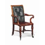 A VICTORIAN MAHOGANY DESK CHAIR
LATE 19TH CENTURY
The back re-upholstered in buttoned green leather,