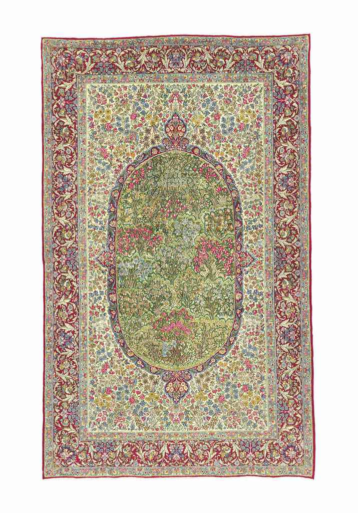 A very fine Kirman rug
approx: 8ft.1in. x 4ft.11in.(246cm. x 150cm.)