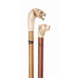 AN IVORY HANDLED MALACCA WALKING STICK
PROBABLY FRENCH, CIRCA 1880
Carved as the head of a hound